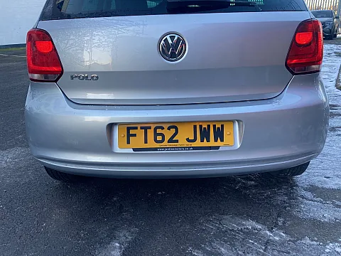 VW Polo 2013 model fitted with color coded rear parking sensors