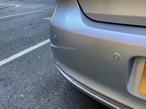 VW Polo 2013 model fitted with color coded rear parking sensors