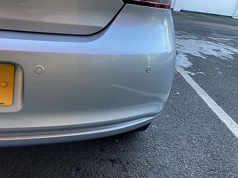 VW Polo 2013 model fitted with color coded rear parking sensors