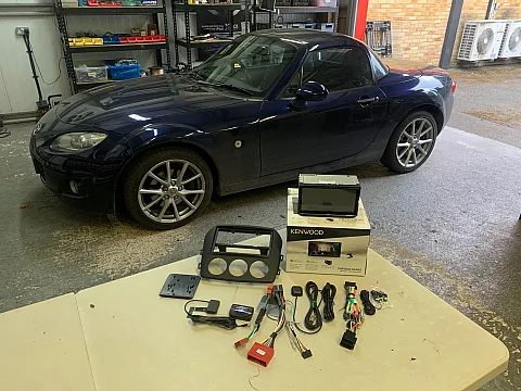 Mazda MX-5 2009 upgraded with a Kenwood DMX8021DABS Wireless CarPlay Stereo